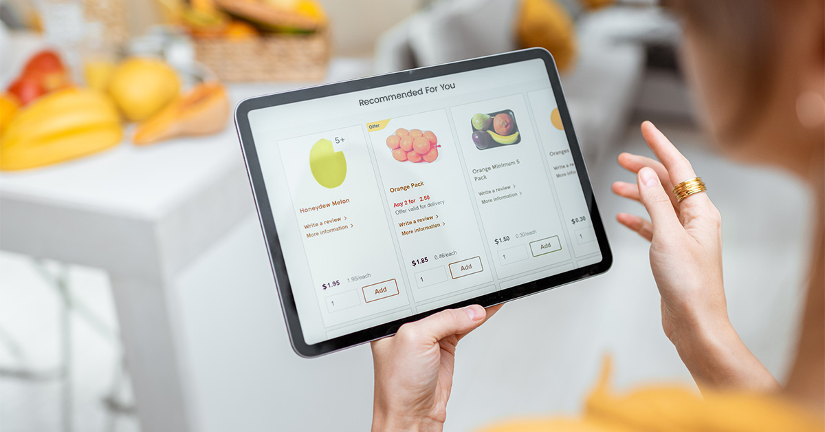 woman online shopping for groceries being presented with product recommendations