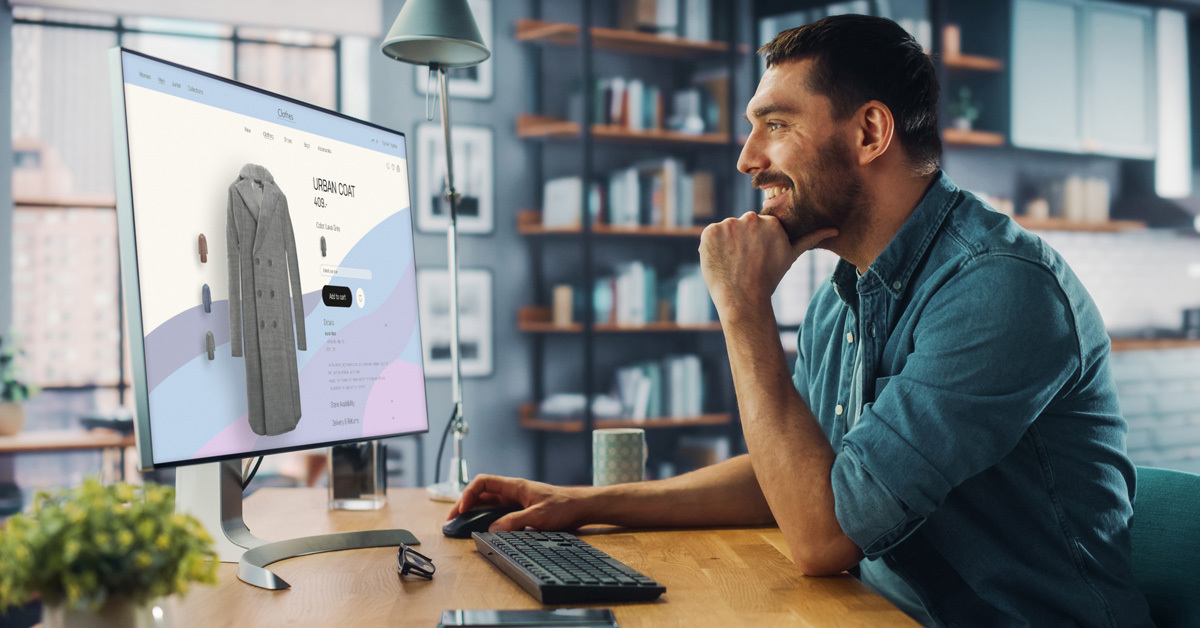 man online shopping for winter coat and is happy with his search results